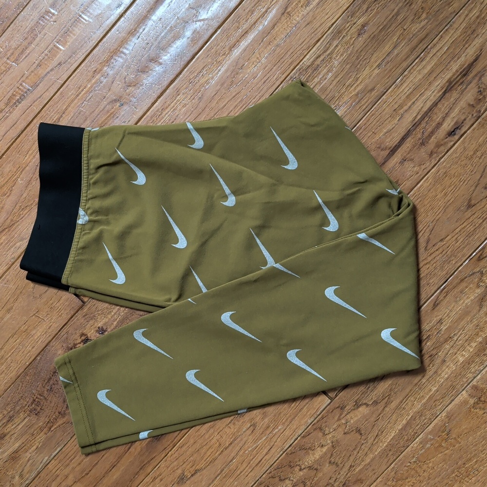 Nike Leg-A-See Allover Olive Green Leggings with White Swoosh Print - Picture 3 of 8